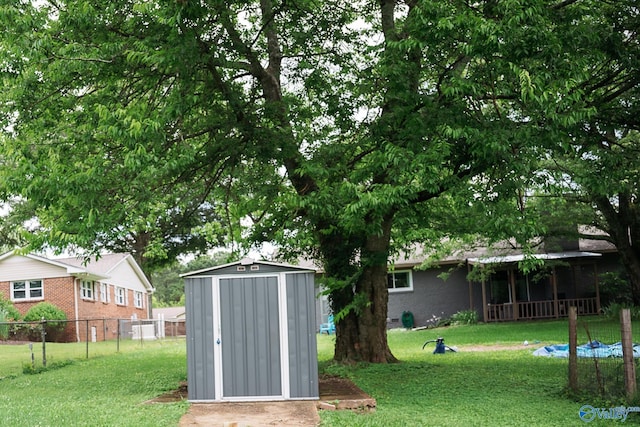 1021 NW 9th St NW, Arab, AL 35016 - view of yard with a storage unit