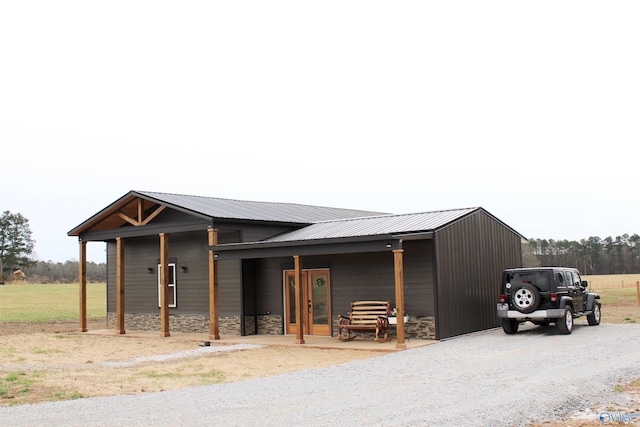 view of outdoor structure with driveway