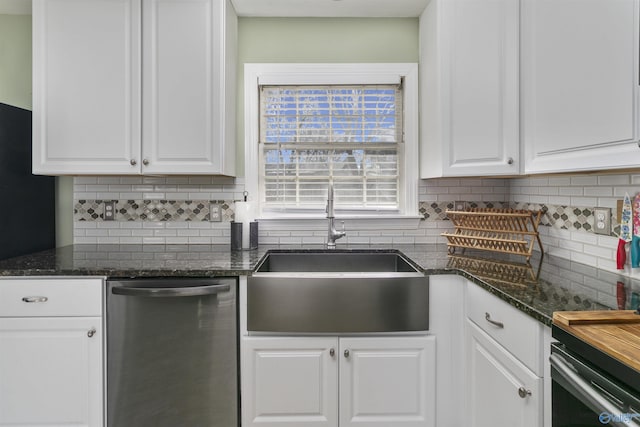 kitchen featuring decorative backsplash, sink, white cabinets, and stainless steel dishwasher