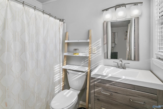 bathroom featuring a shower with shower curtain, vanity, toilet, and ornamental molding