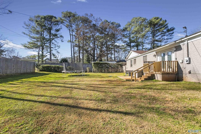 view of yard featuring a trampoline