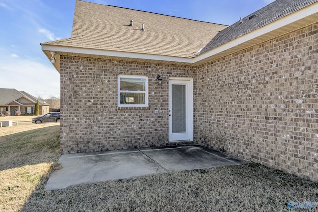 doorway to property with a patio