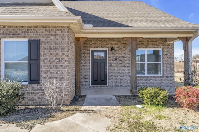 property entrance with a patio area