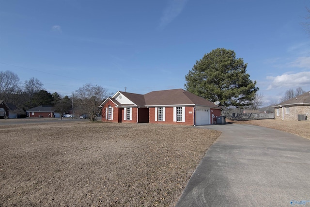 single story home with a garage