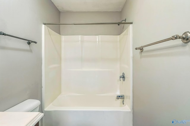 full bathroom with shower / tub combination, vanity, and toilet