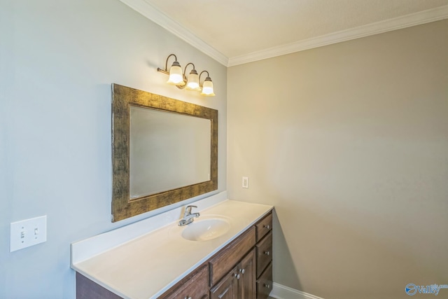 bathroom featuring crown molding and vanity