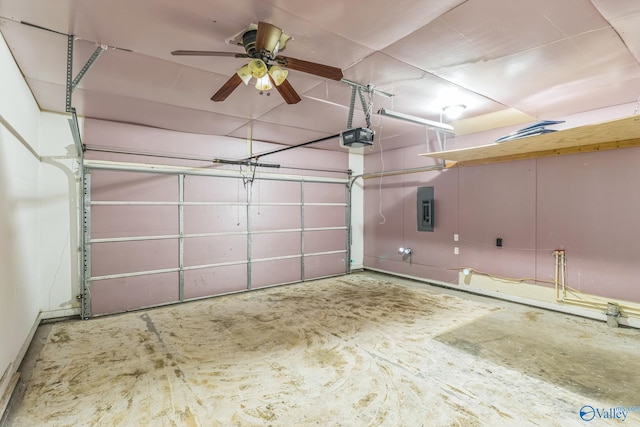 garage featuring ceiling fan, electric panel, and a garage door opener