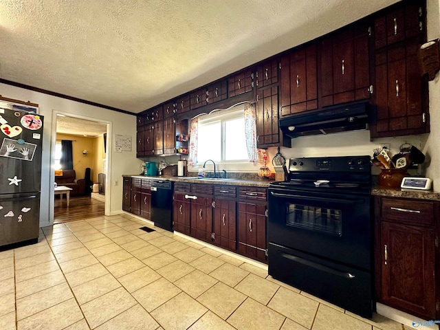 kitchen with black appliances, crown molding, sink, light tile patterned floors, and a textured ceiling