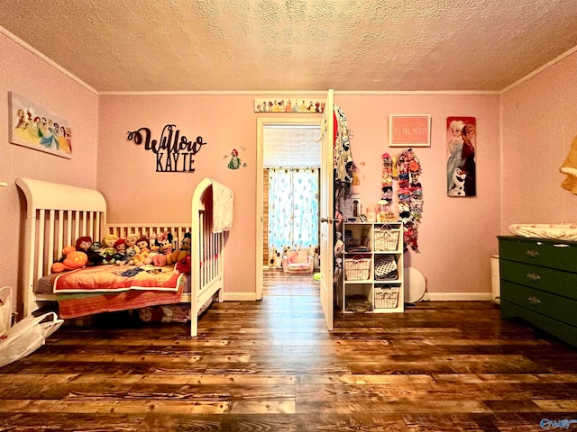 bedroom with a textured ceiling, crown molding, and dark wood-type flooring