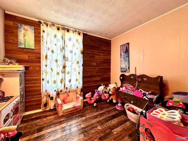 bedroom featuring wood-type flooring, a textured ceiling, ornamental molding, and wooden walls