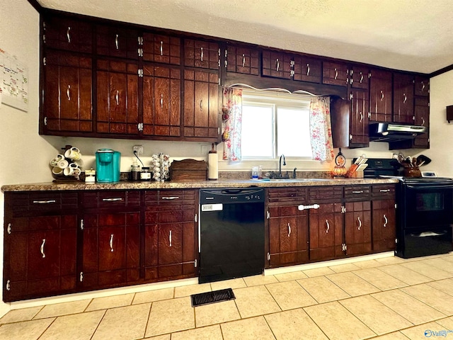 kitchen with a textured ceiling, sink, black appliances, and extractor fan