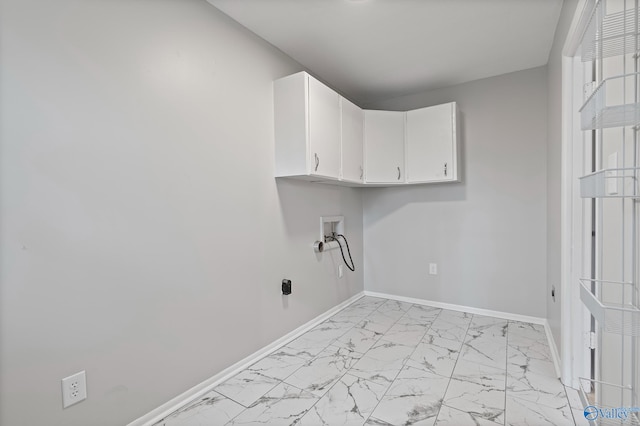 laundry room with cabinets, hookup for an electric dryer, and hookup for a washing machine