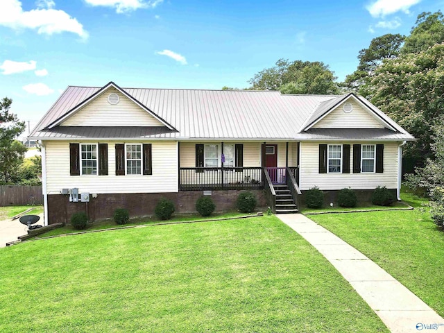 single story home with a porch and a front lawn