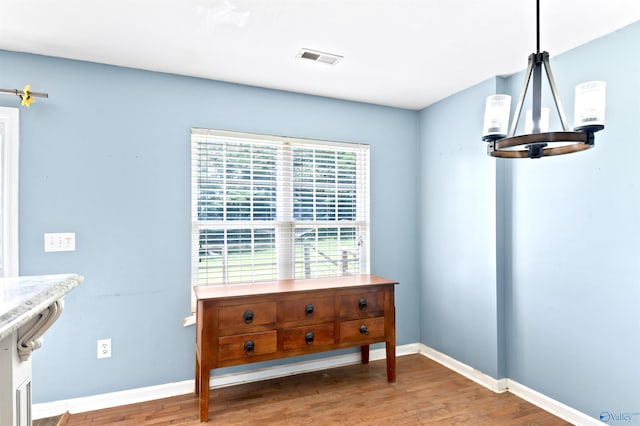 dining area featuring hardwood / wood-style flooring