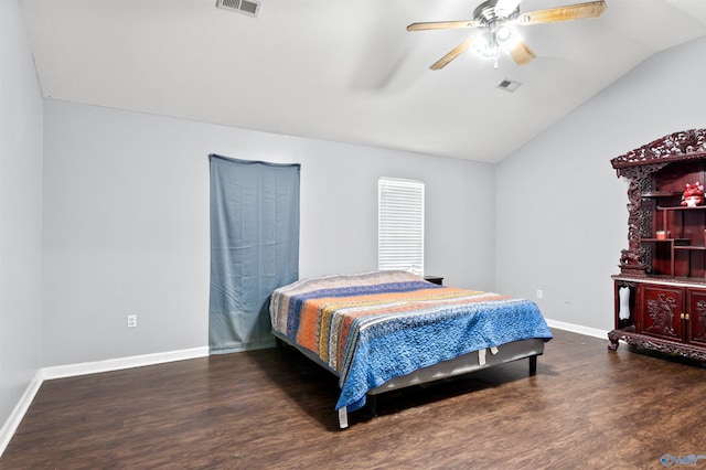 bedroom featuring vaulted ceiling, ceiling fan, and dark wood-type flooring