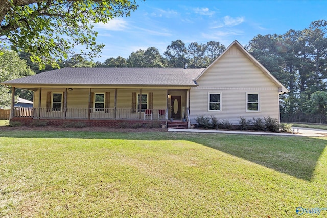 single story home featuring a front yard and covered porch