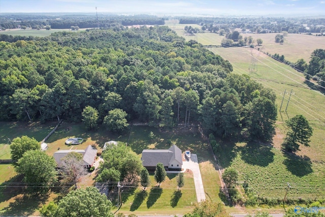 birds eye view of property with a rural view