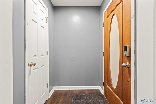 entrance foyer with dark hardwood / wood-style flooring