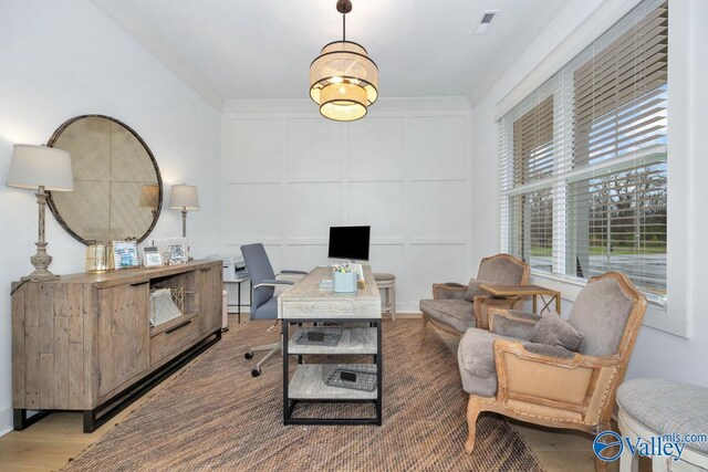 office area with hardwood / wood-style flooring