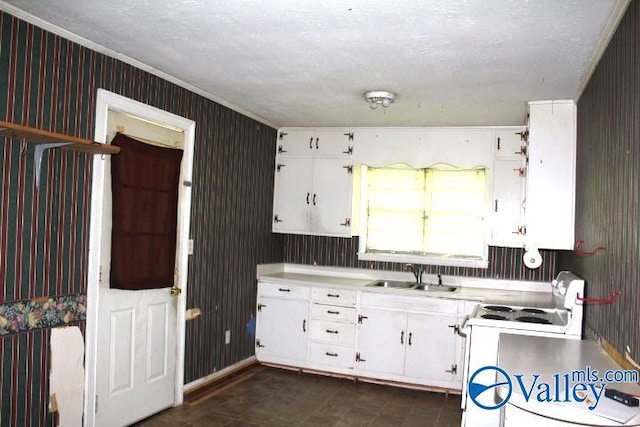 kitchen with a sink, white electric range oven, white cabinetry, wallpapered walls, and light countertops