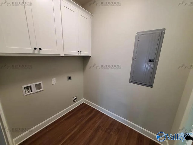 clothes washing area featuring electric panel, hookup for an electric dryer, cabinets, dark hardwood / wood-style floors, and hookup for a washing machine