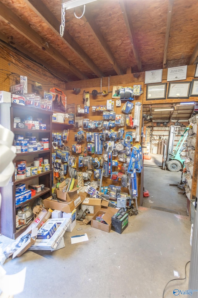 interior space with concrete floors and a workshop area