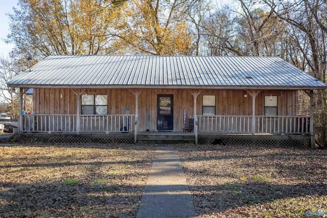 farmhouse inspired home with covered porch