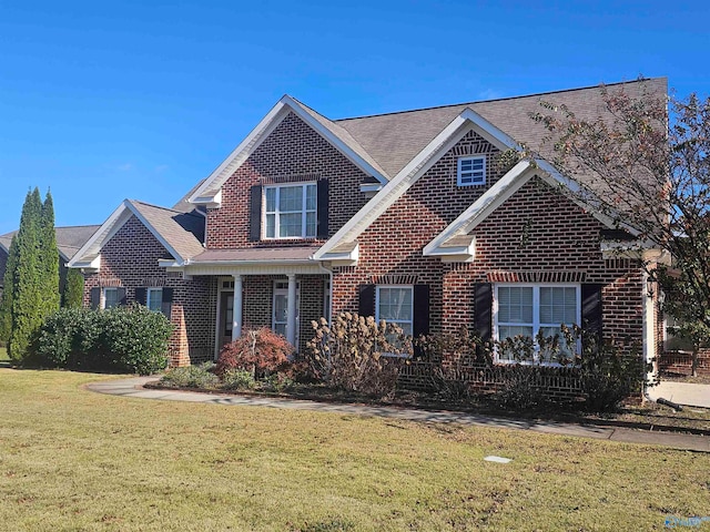 view of front facade with a front lawn