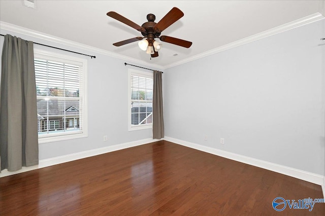 empty room featuring dark hardwood / wood-style floors, ceiling fan, and ornamental molding