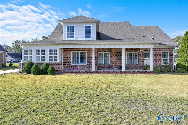 view of front of home with a front yard