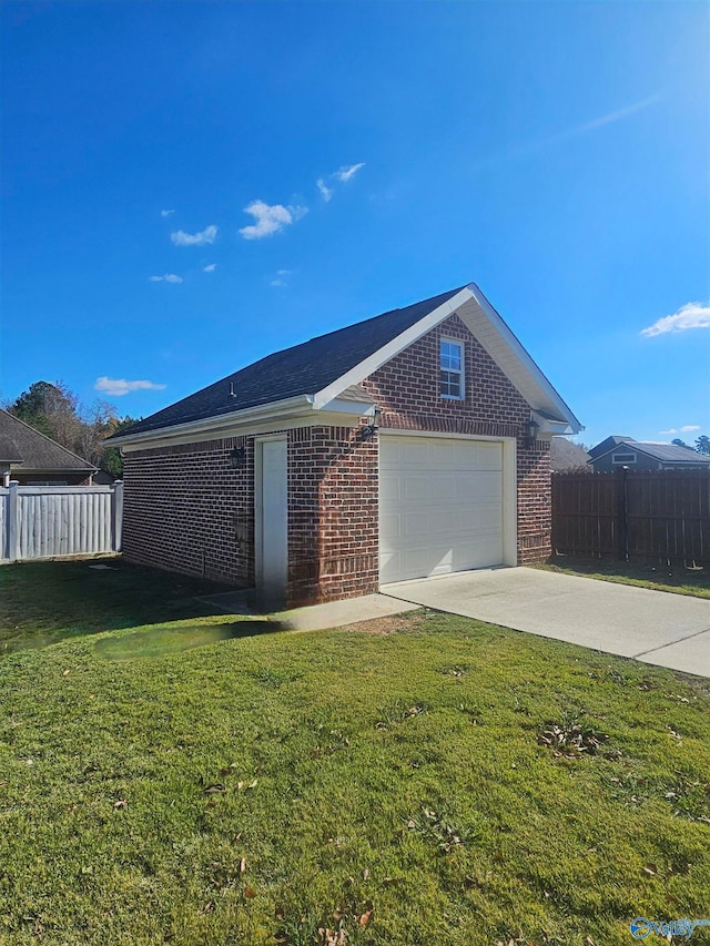 view of property exterior featuring a yard and a garage