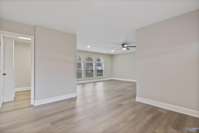 unfurnished room featuring ceiling fan, baseboards, wood finished floors, and recessed lighting