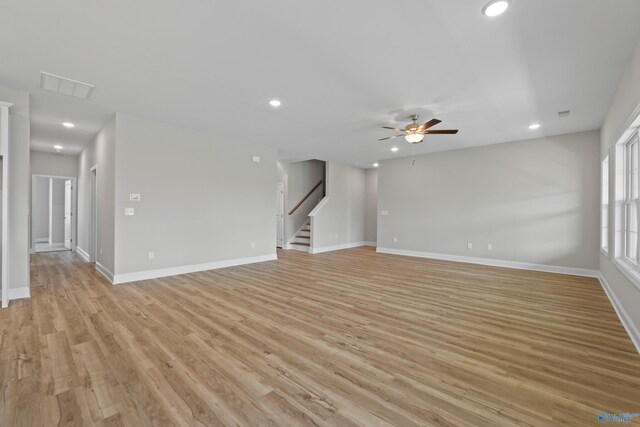 view of patio with ceiling fan and an outdoor living space