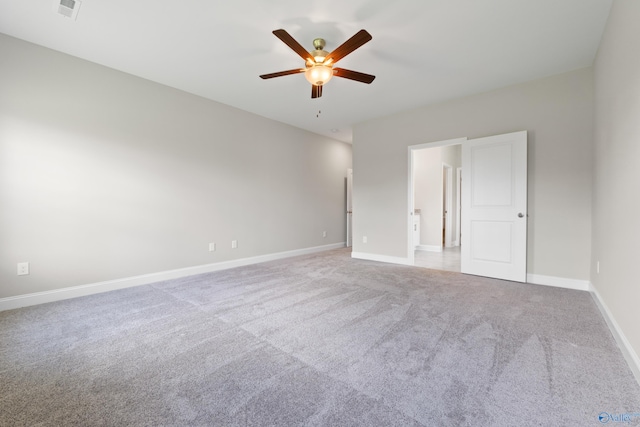 interior space featuring ceiling fan and light carpet