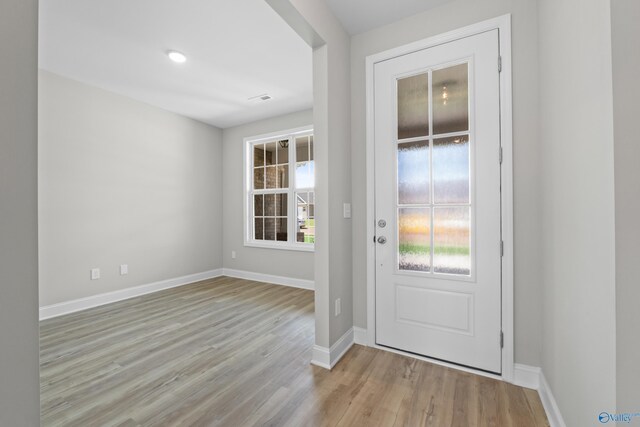 bedroom with ceiling fan, hardwood / wood-style flooring, and ensuite bathroom