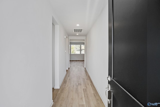 hallway featuring light hardwood / wood-style floors