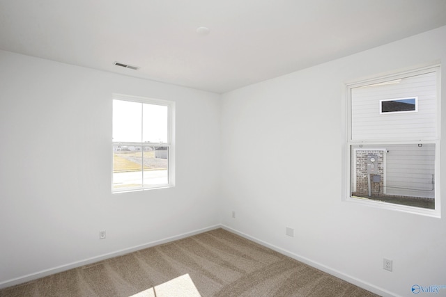 view of carpeted spare room