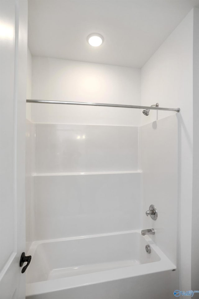 bathroom with shower / bathing tub combination