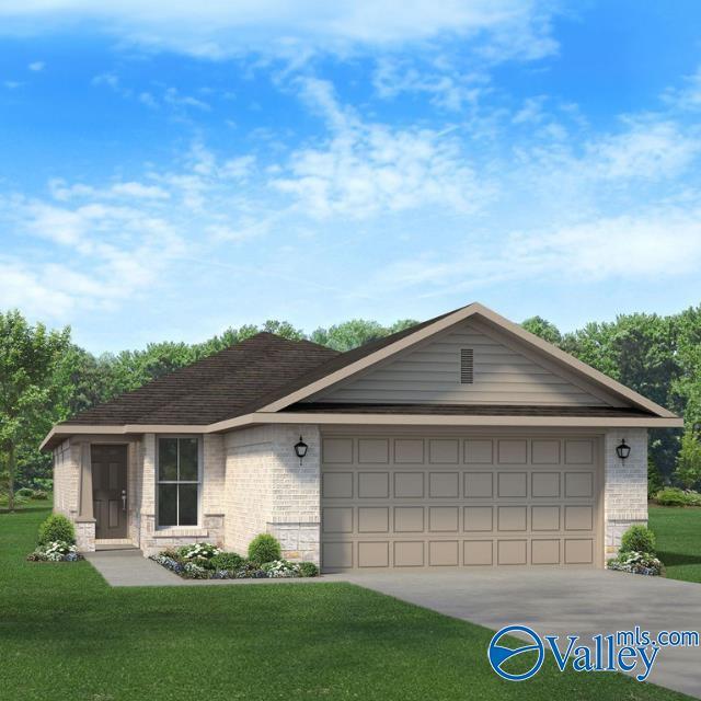 view of front of home with a garage and a front yard