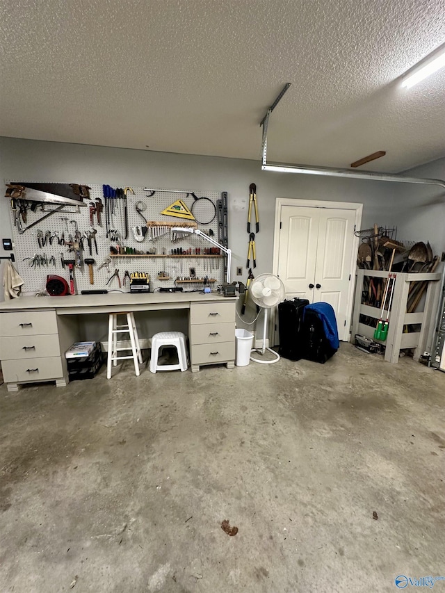 garage featuring a workshop area