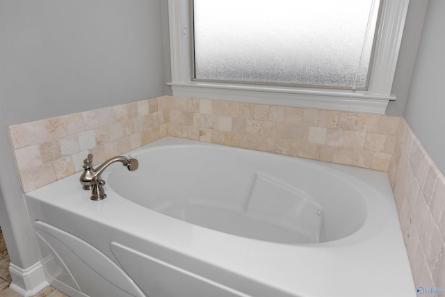 bathroom featuring a tub