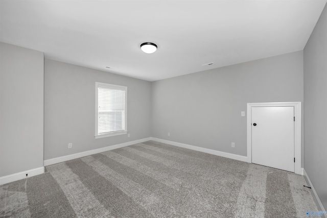 empty room featuring carpet