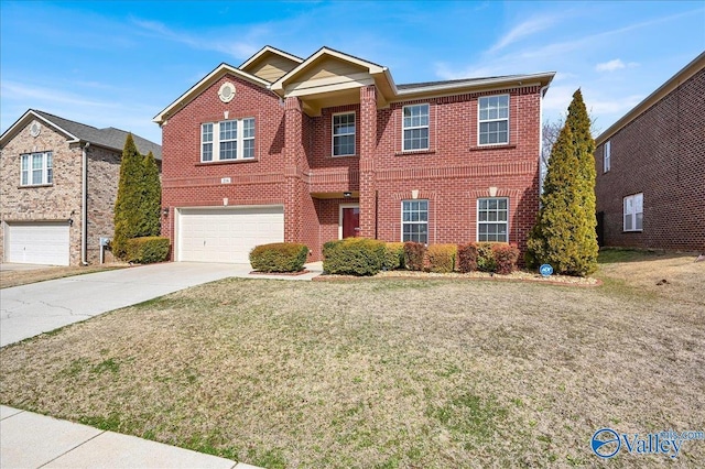 traditional home with a garage, a front yard, concrete driveway, and brick siding