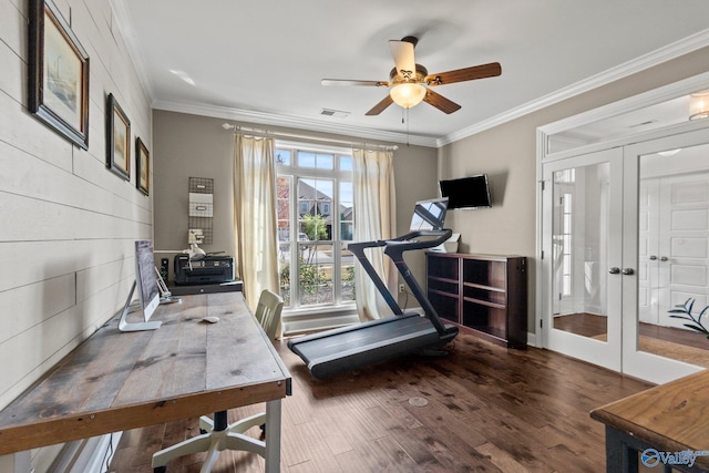 workout room featuring a ceiling fan, ornamental molding, french doors, and wood finished floors