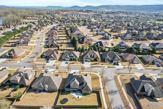 bird's eye view with a residential view and a mountain view
