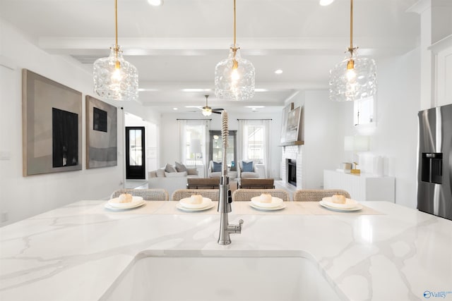 interior space featuring stainless steel fridge