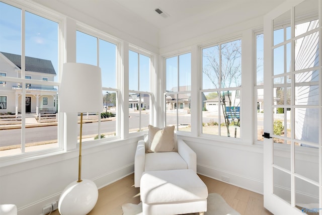 sunroom / solarium with a healthy amount of sunlight