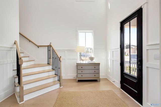 foyer with light hardwood / wood-style flooring