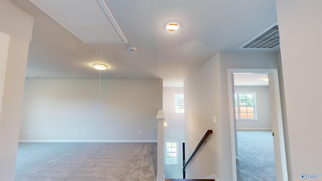 209 Roman Randall Rd, New Market, AL 35761 - hall with visible vents, attic access, carpet flooring, and an upstairs landing