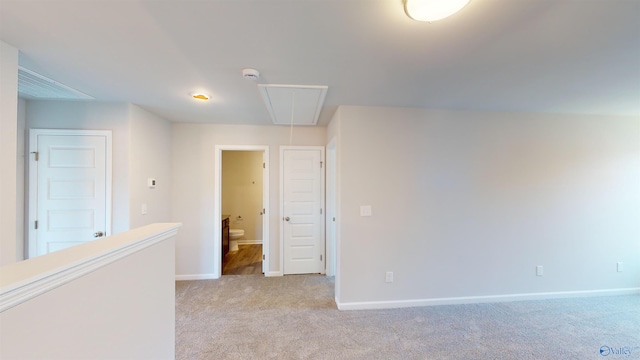 209 Roman Randall Rd, New Market, AL 35761 - unfurnished room featuring baseboards, attic access, and light carpet